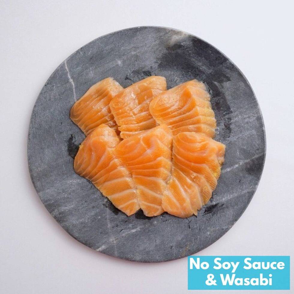 Salmon sashimi marinated with lemon